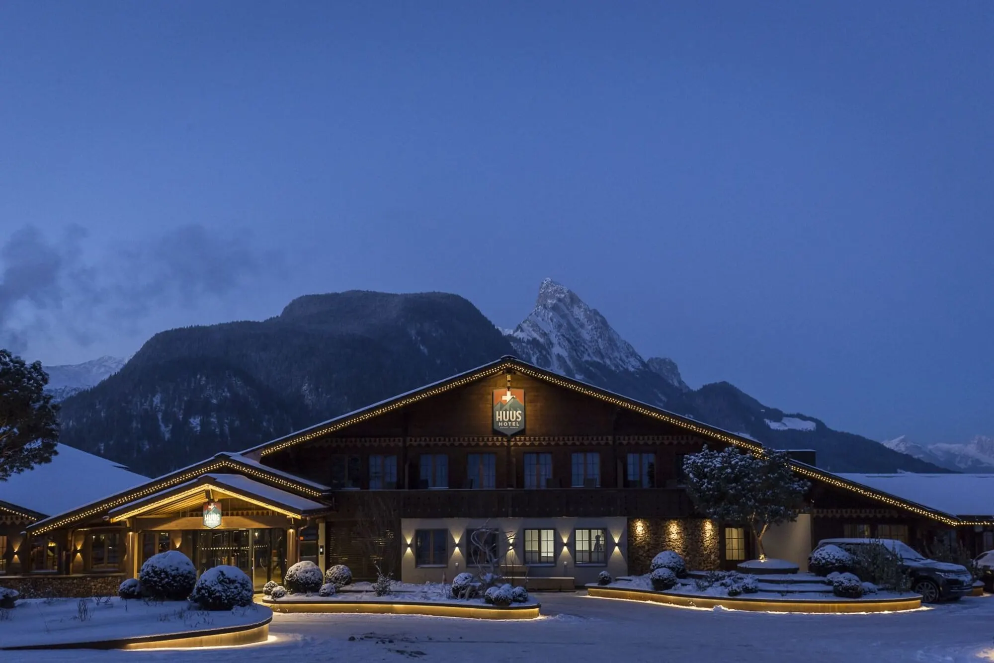 The hotel lit up at dusk