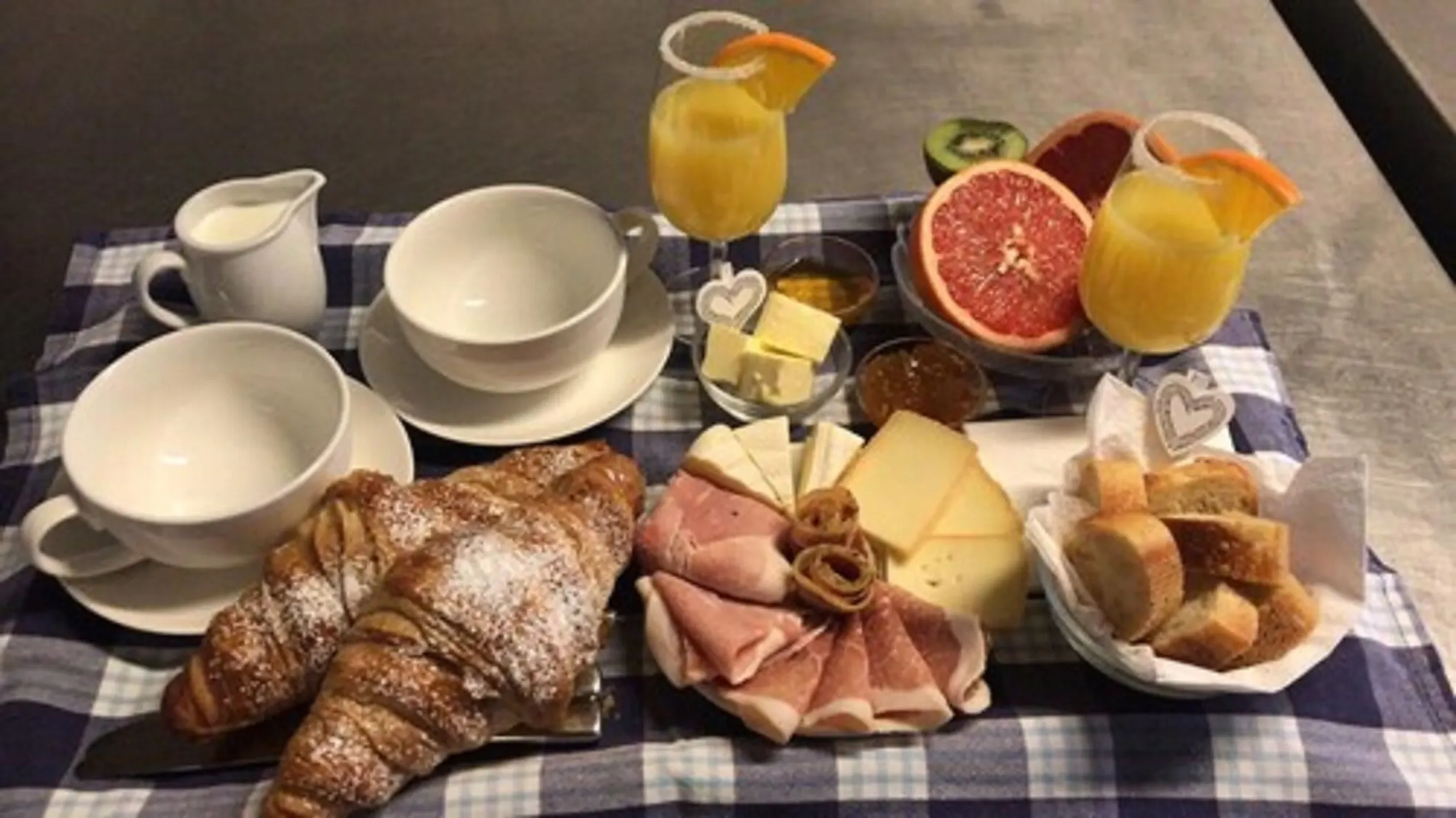 Breakfast with croissants and fruit