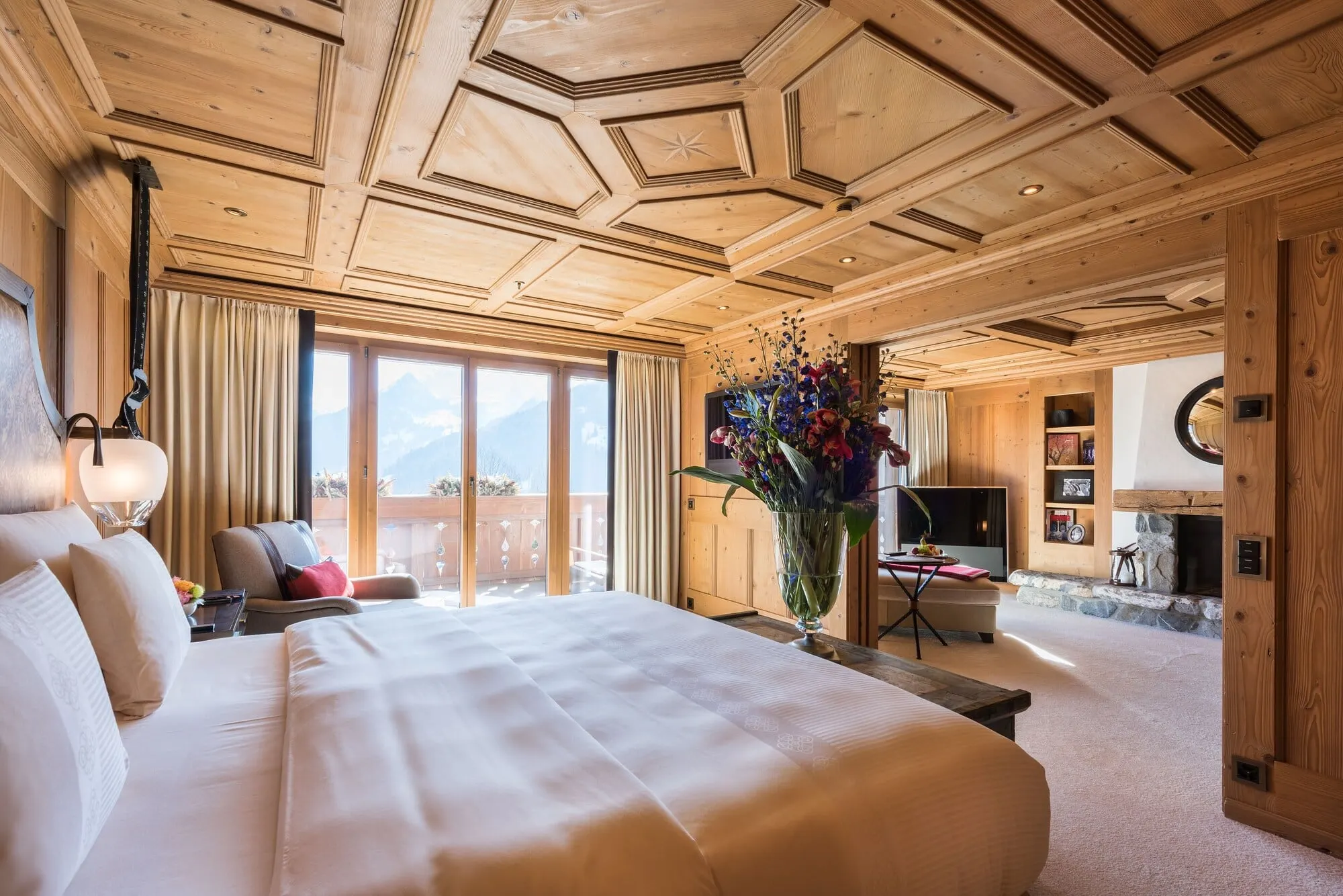 A bedroom with a mountain view