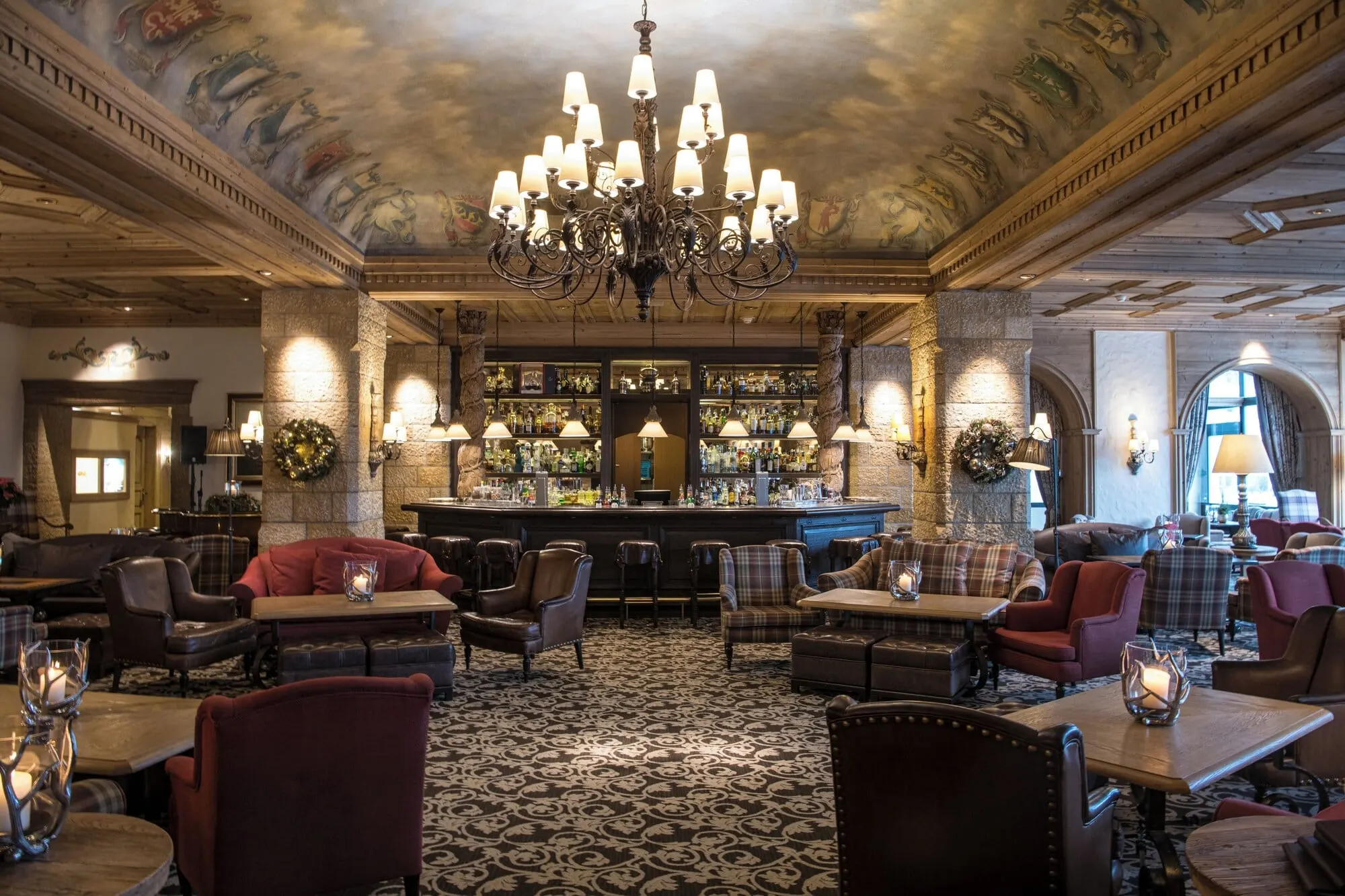 The lobby bar under a chandelier