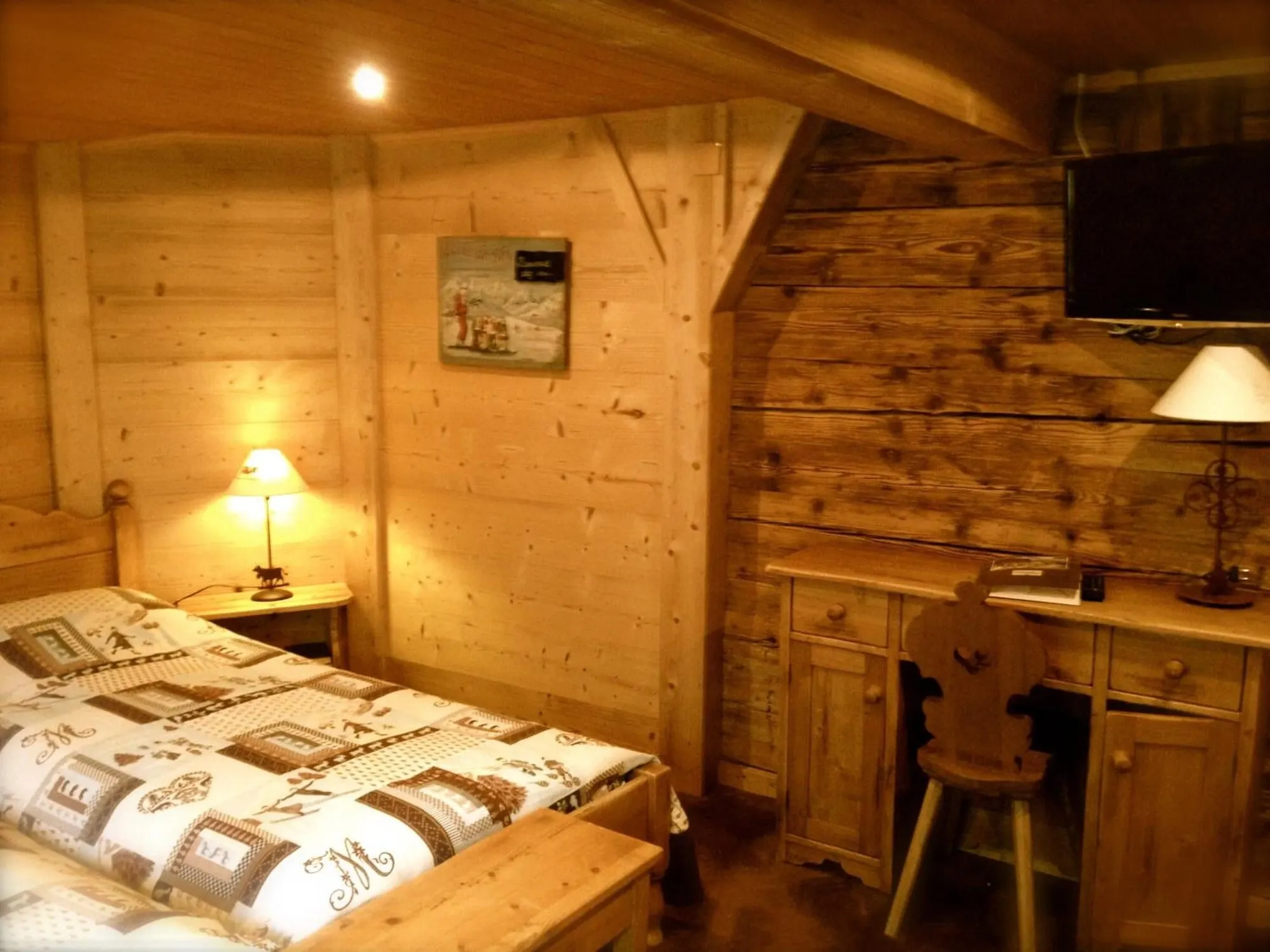A pine-panelled double room