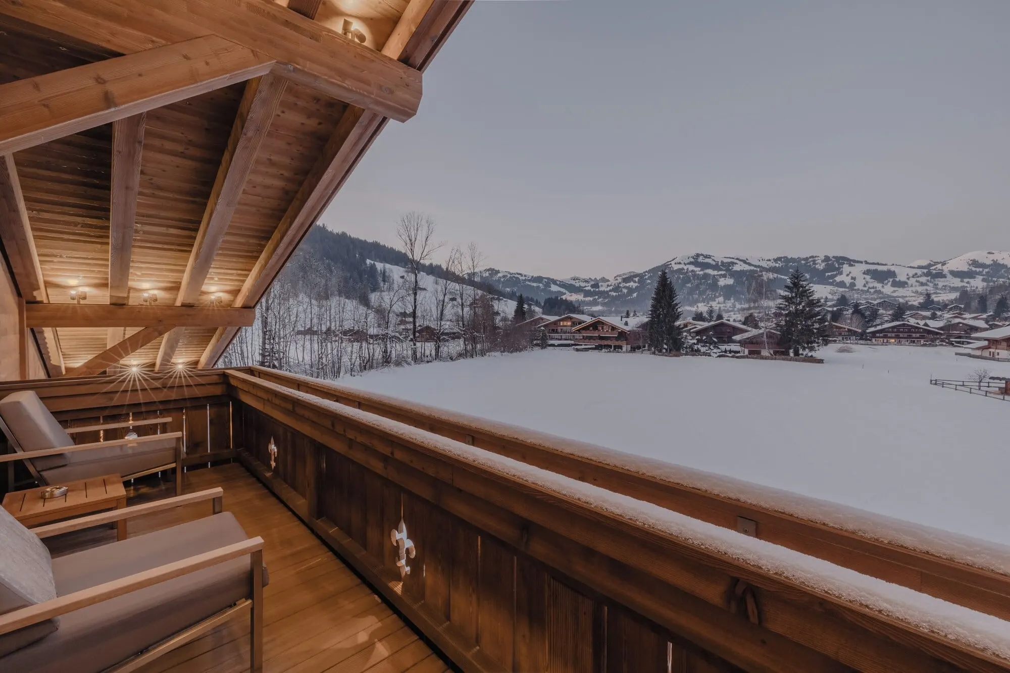 A balcony over snowy meadows