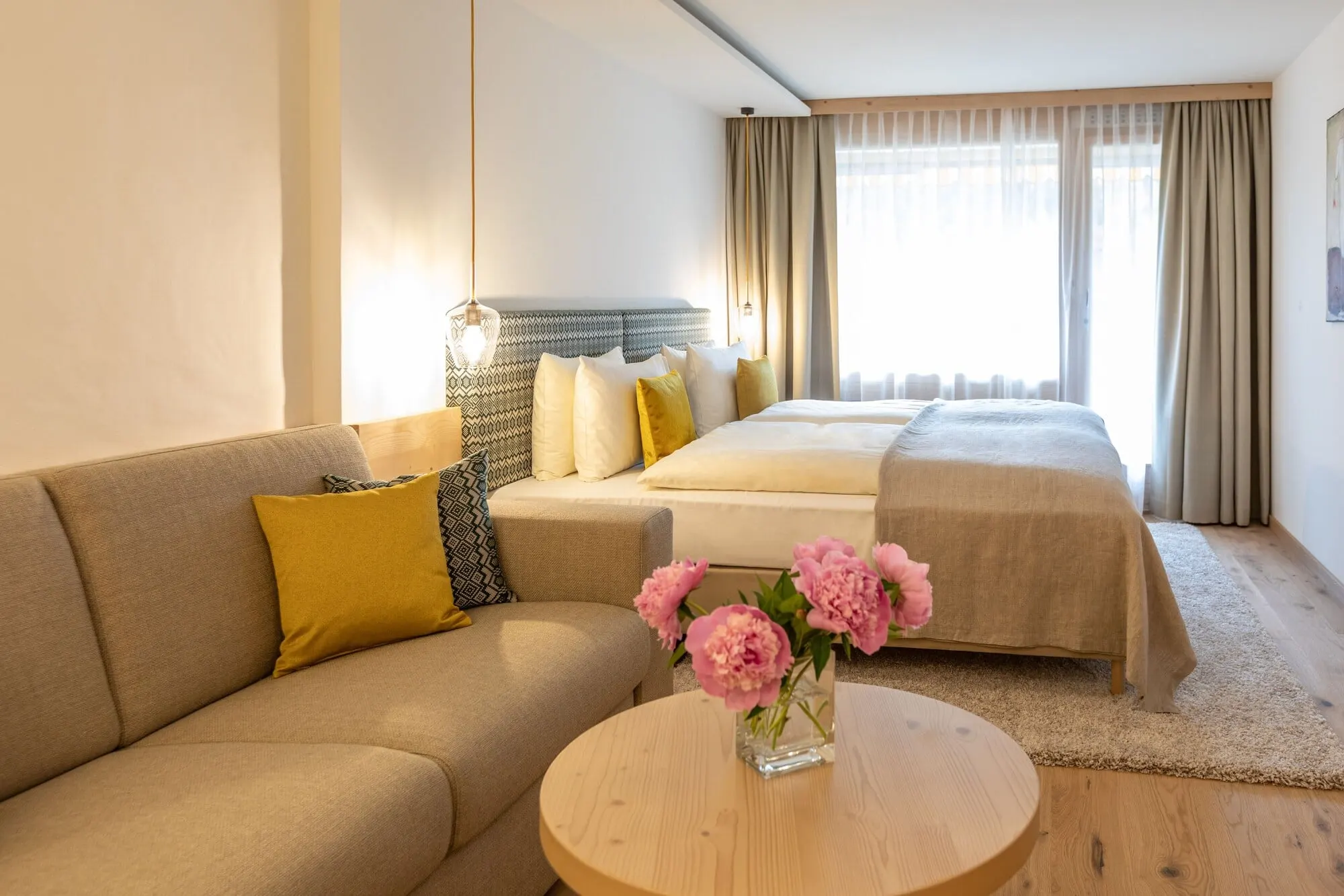 A double room with a sofa