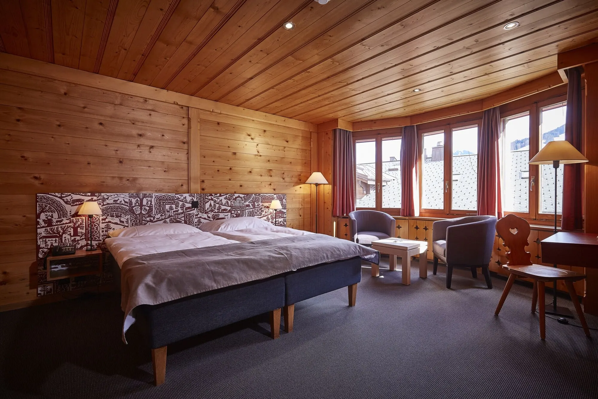 A wood-panelled twin room