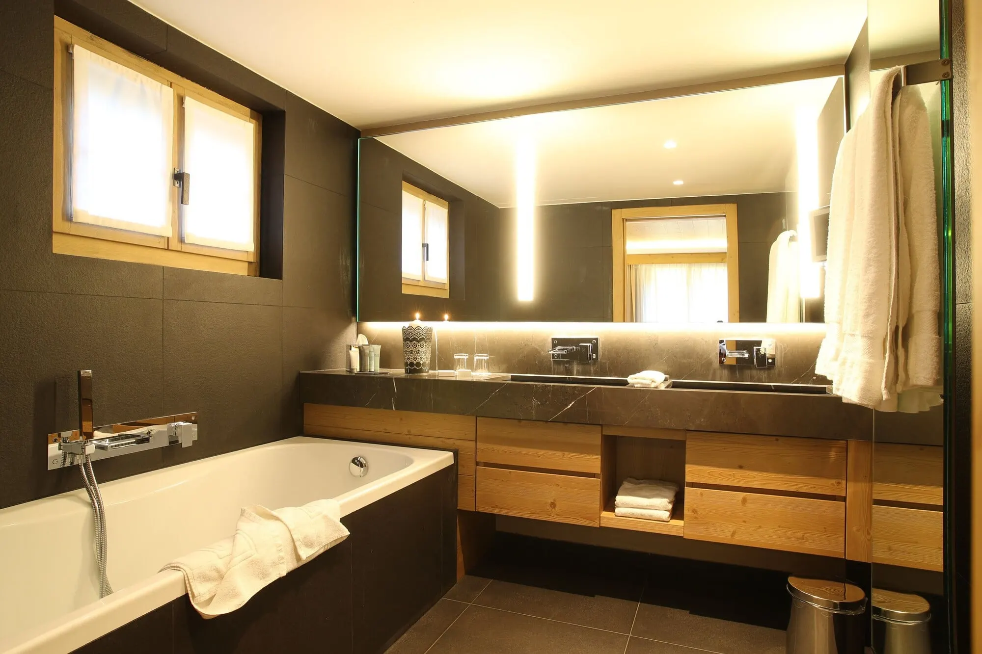 A bathroom with a bath
