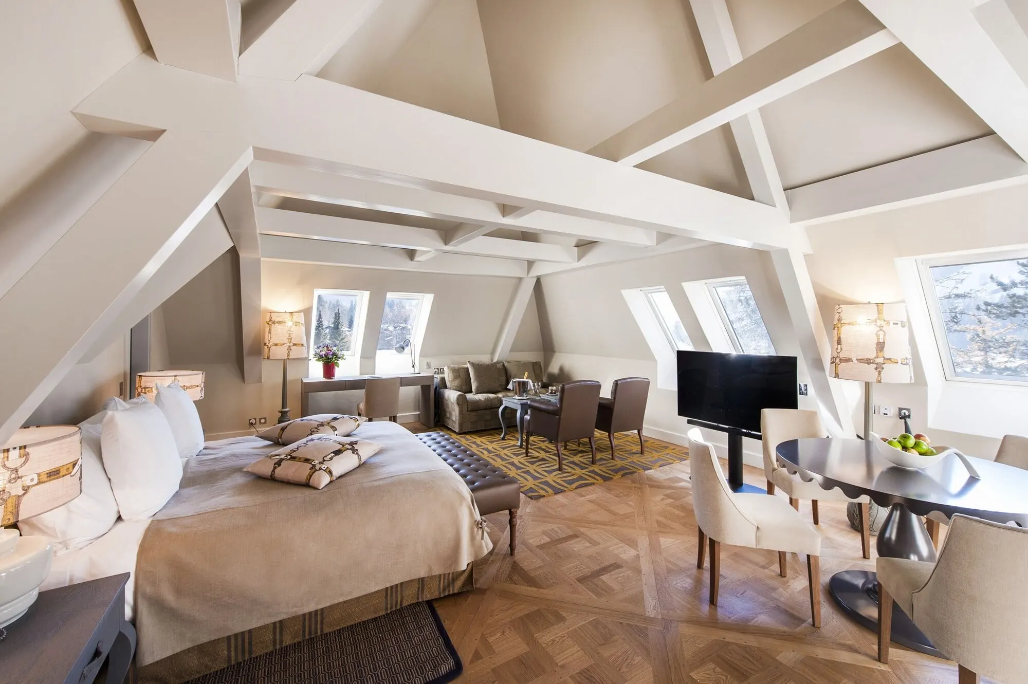 A bedroom under the roof beams
