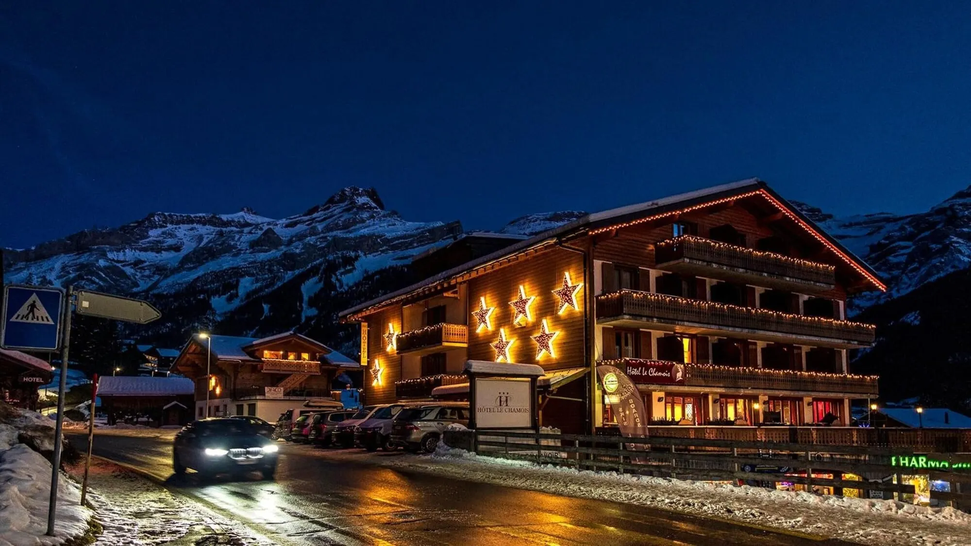 The hotel lit up on a winter evening
