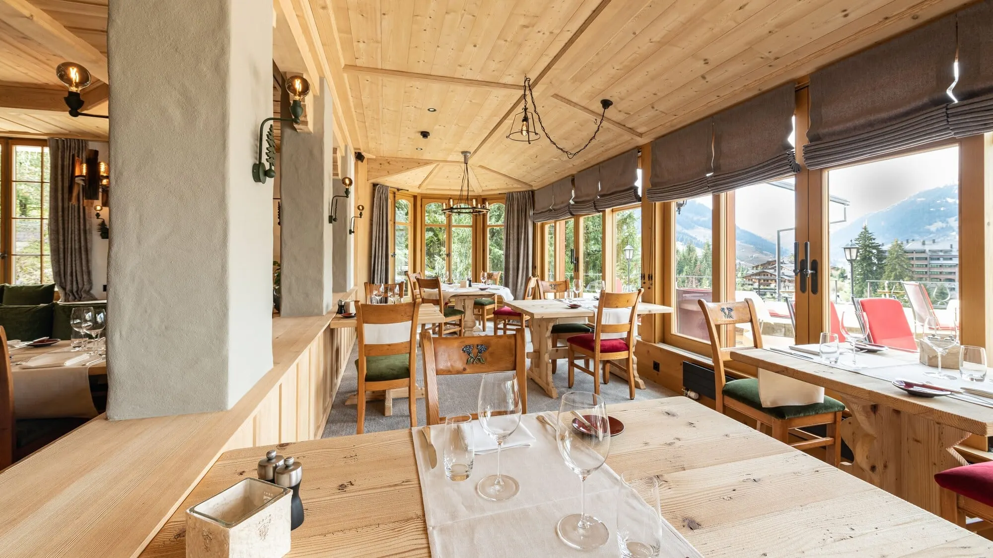 A dining room lined with windows