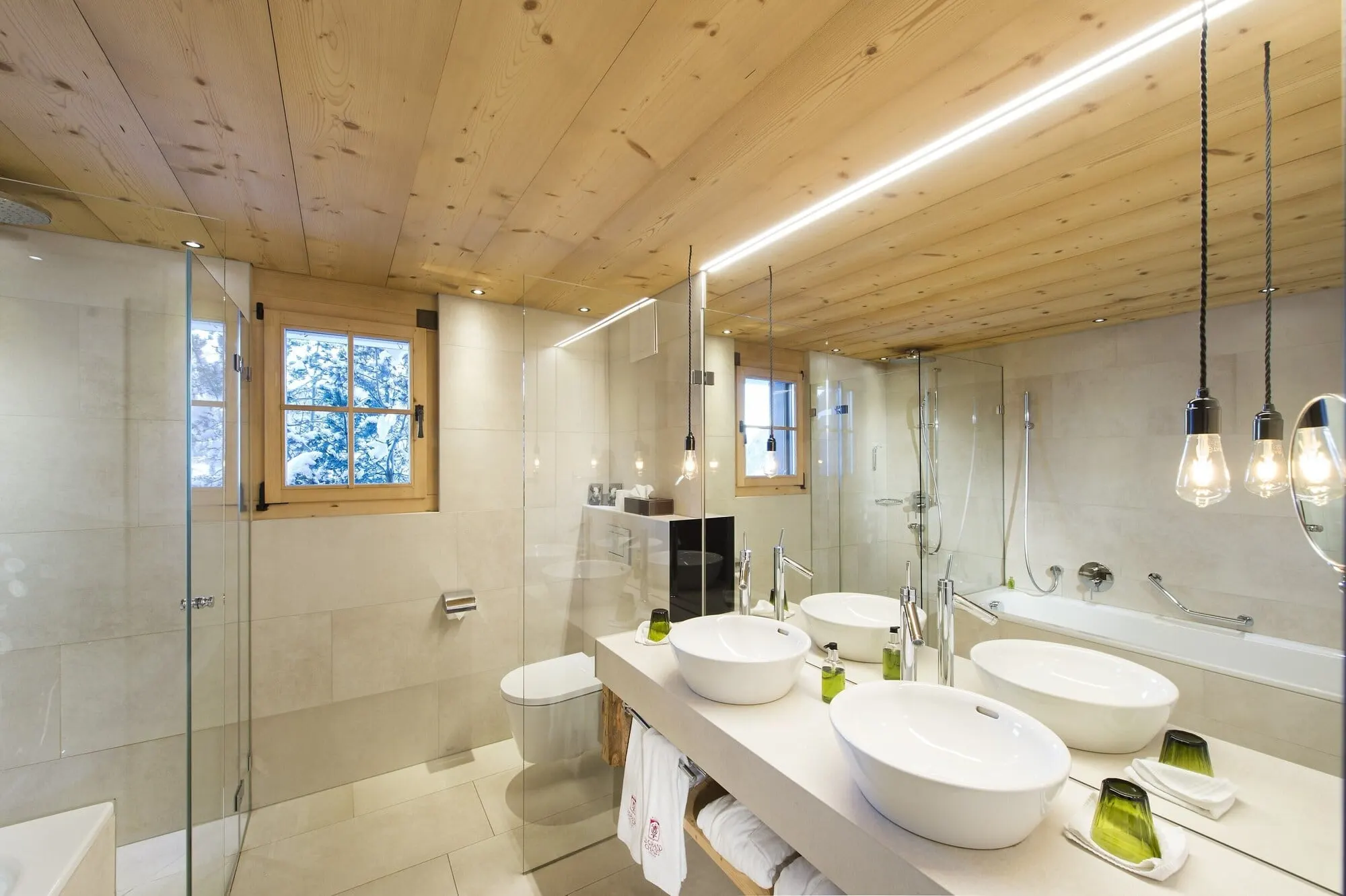 A bathroom with two basins