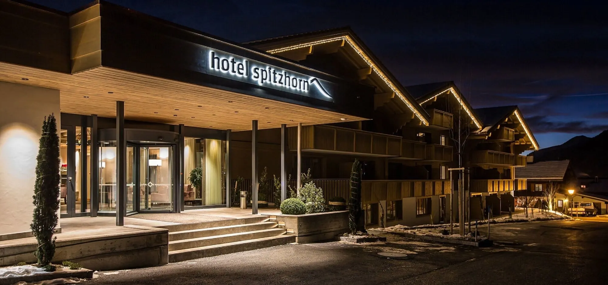 The hotel entrance at night