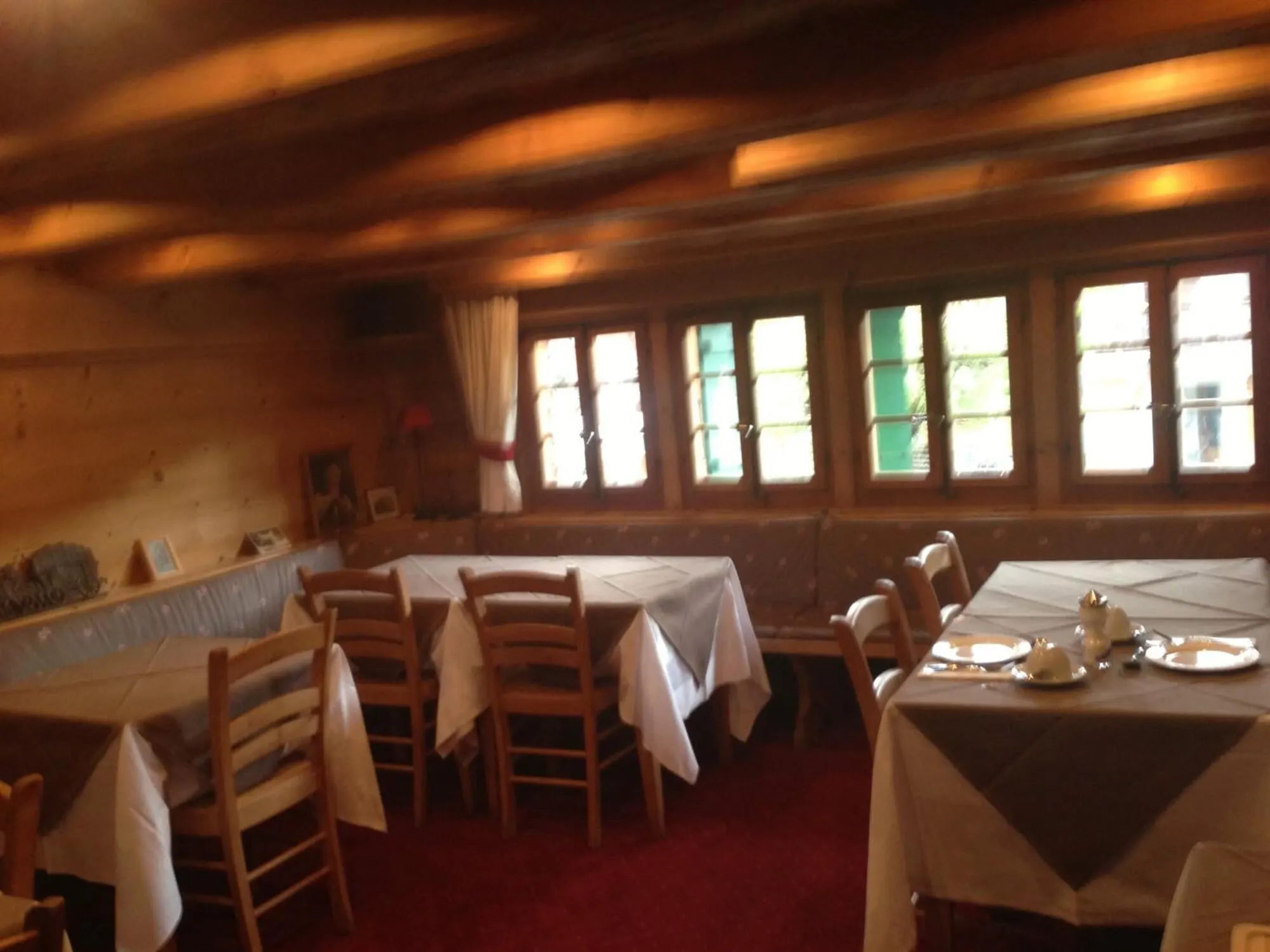 A dining room with laid tables