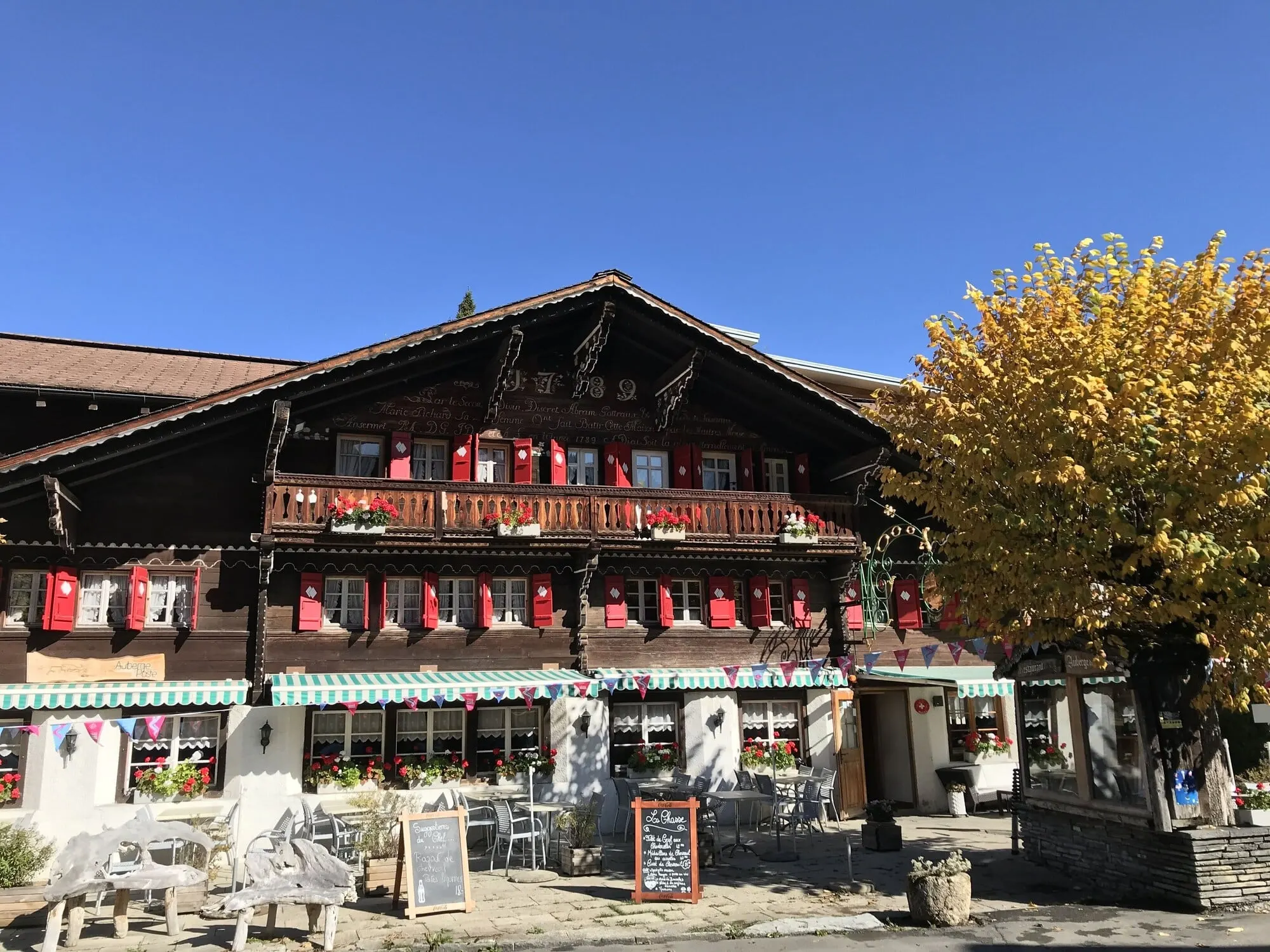The old chalet inn in autumn