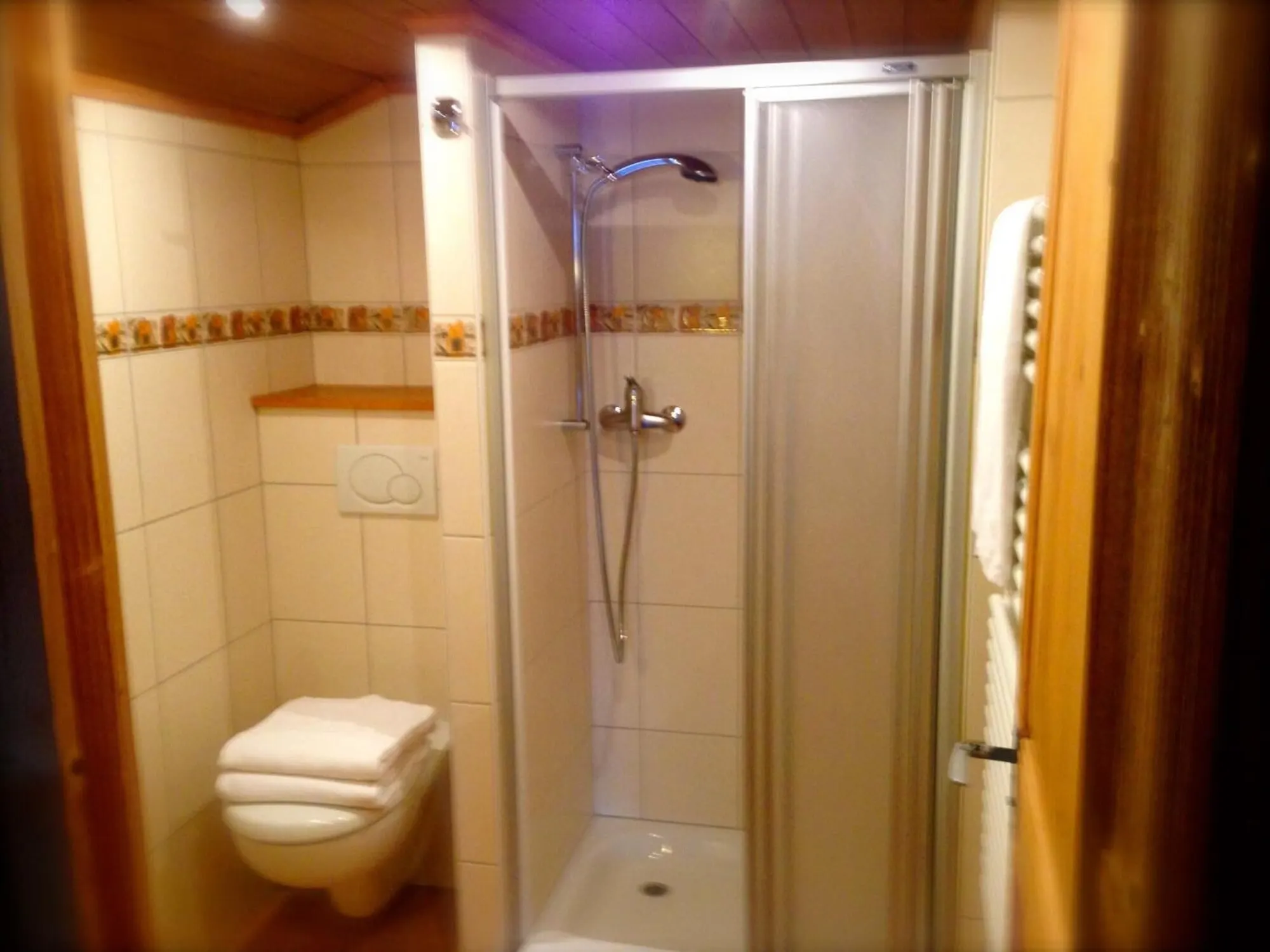 A bathroom with a shower