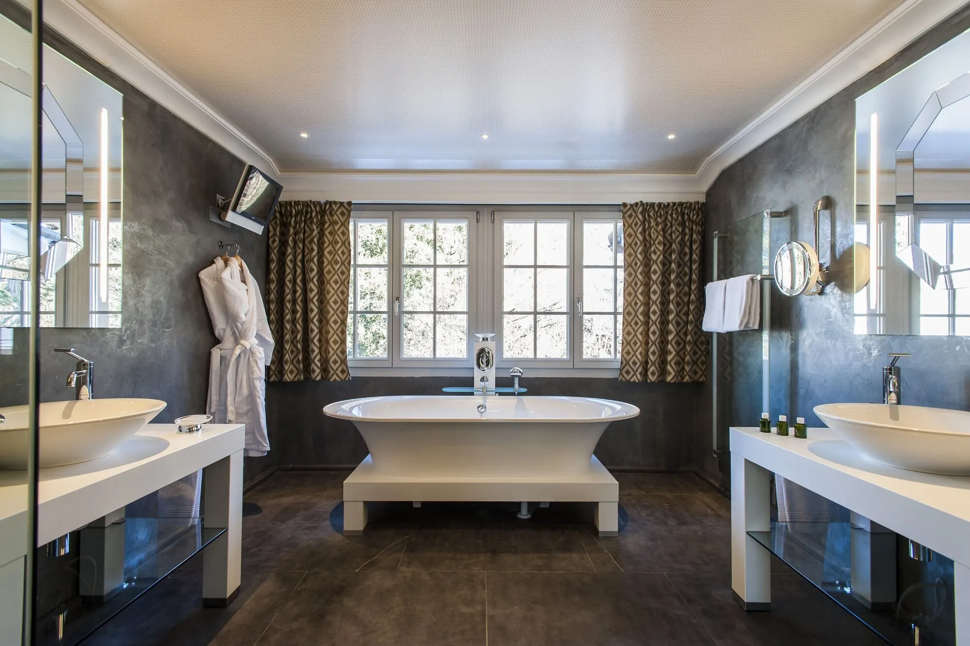 A bathroom with a freestanding bath