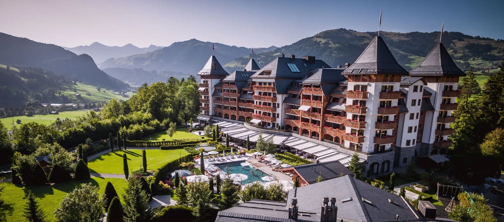 The hotel and its gardens in summer