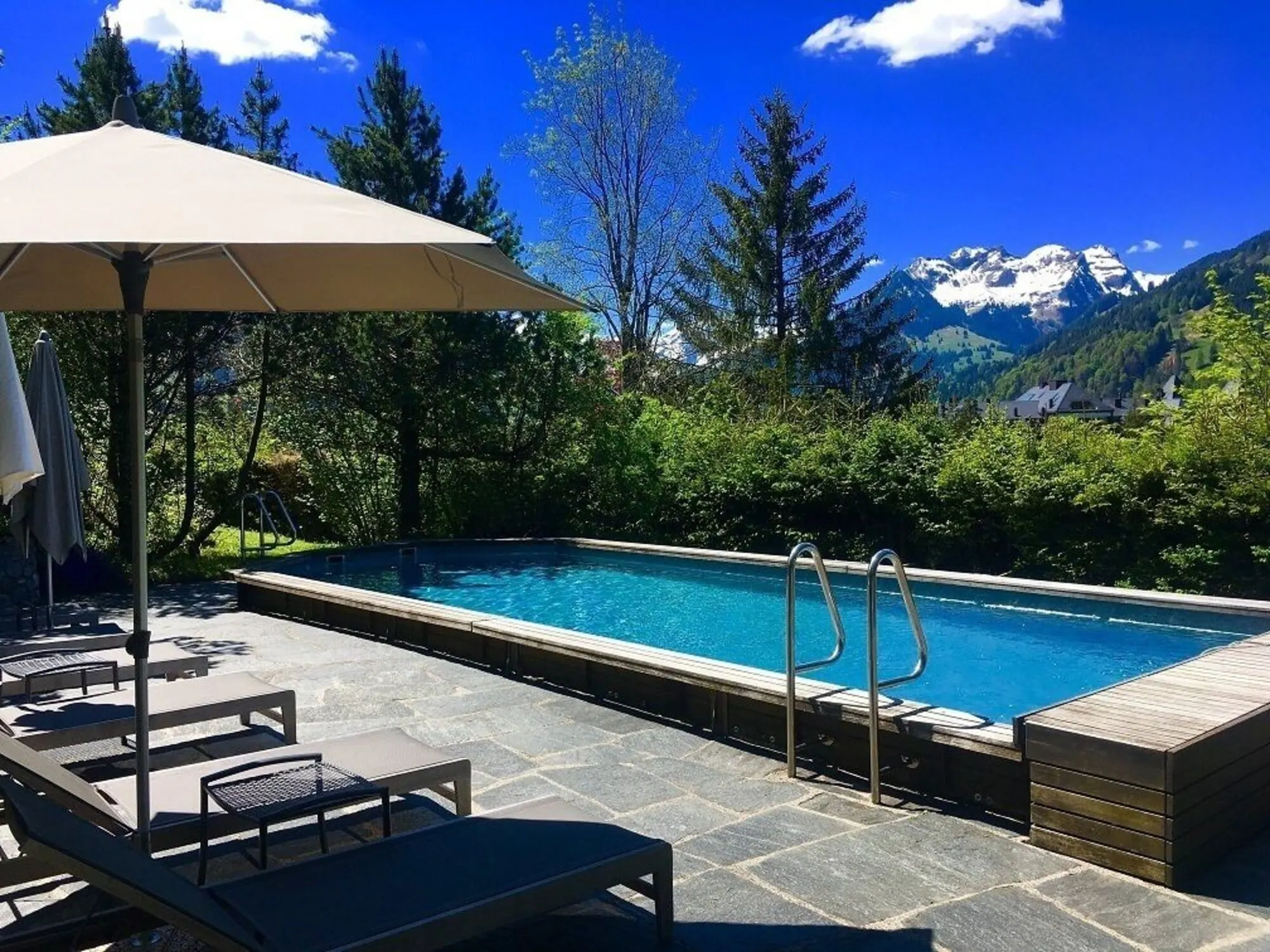 The outdoor pool and loungers