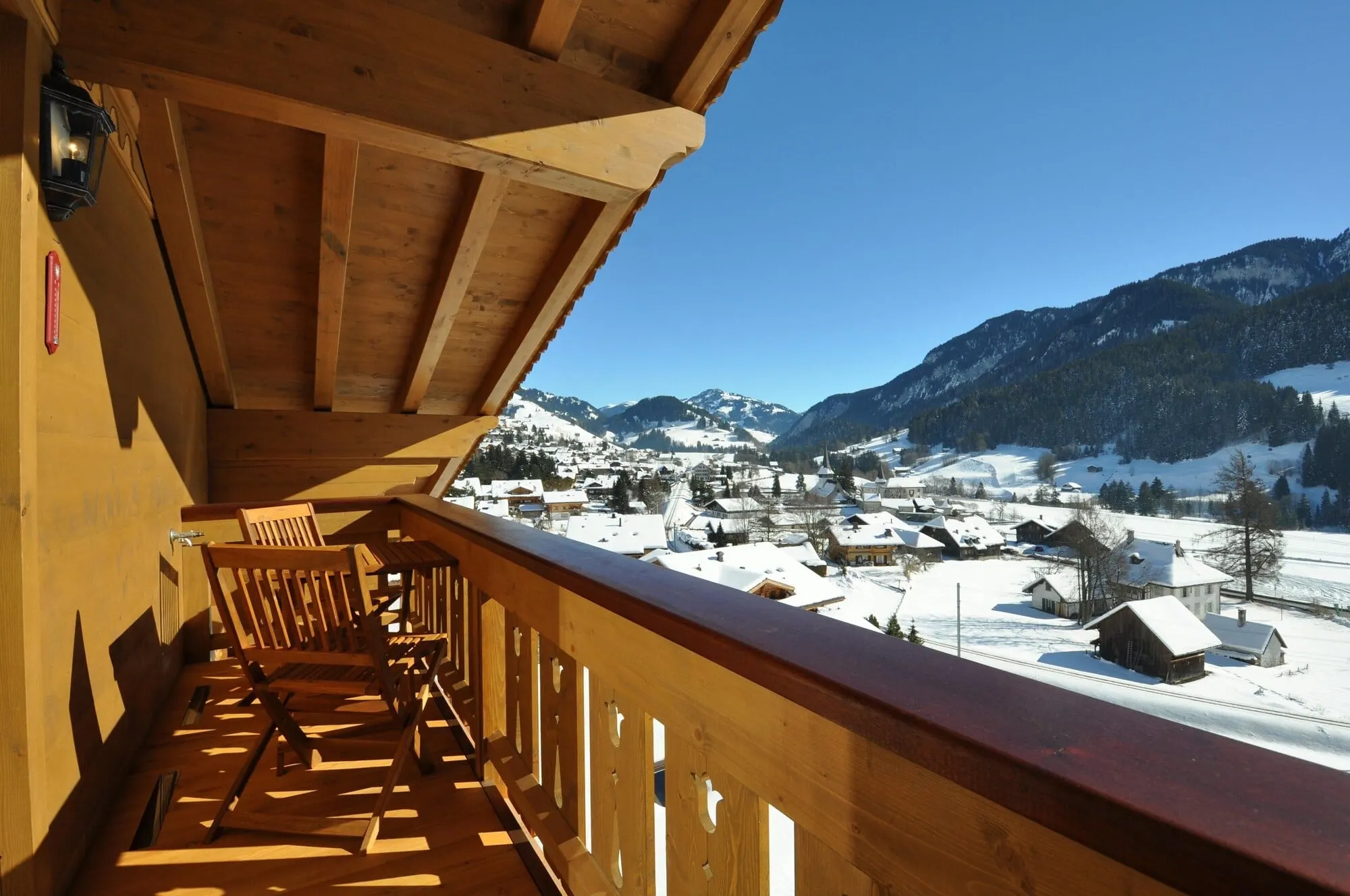 The snowy valley from a balcony