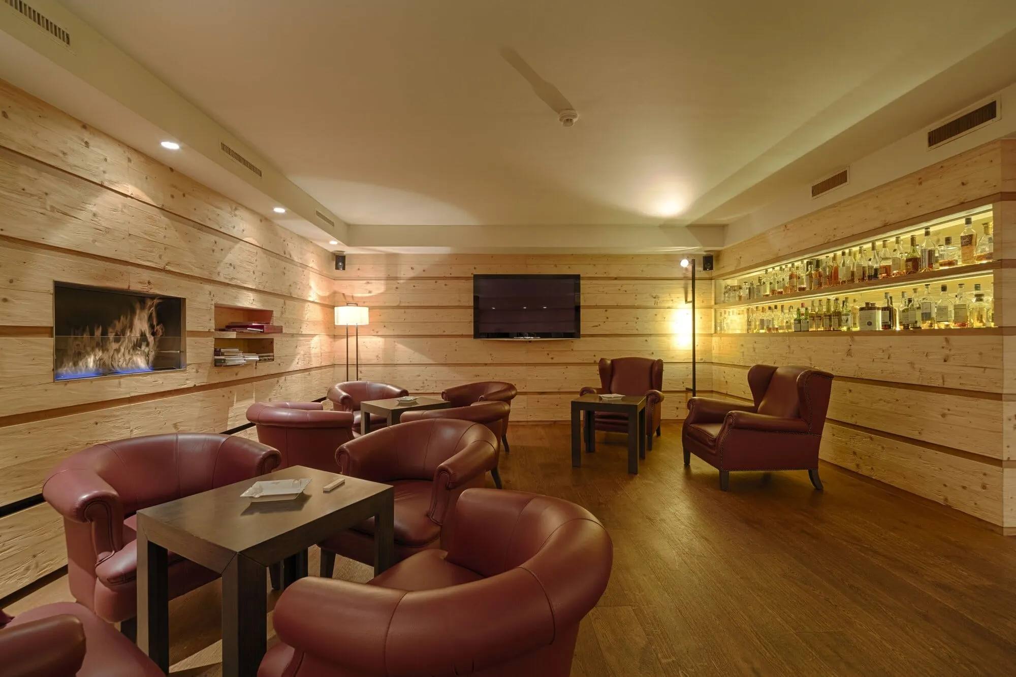A lounge with leather armchairs