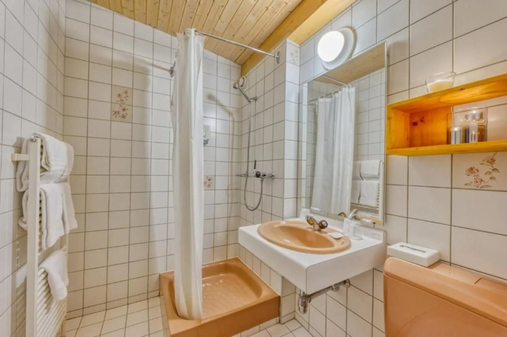 A bathroom with a shower