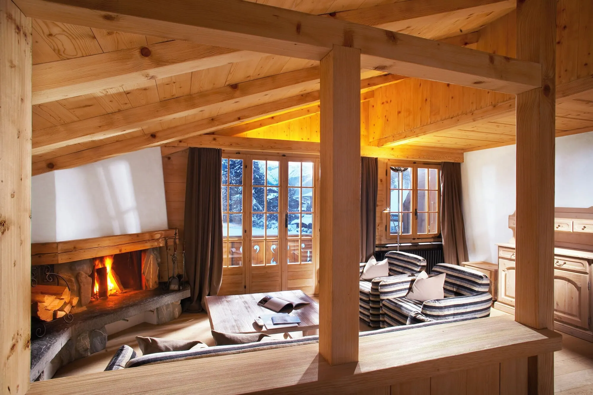 An apartment living room with an open fire