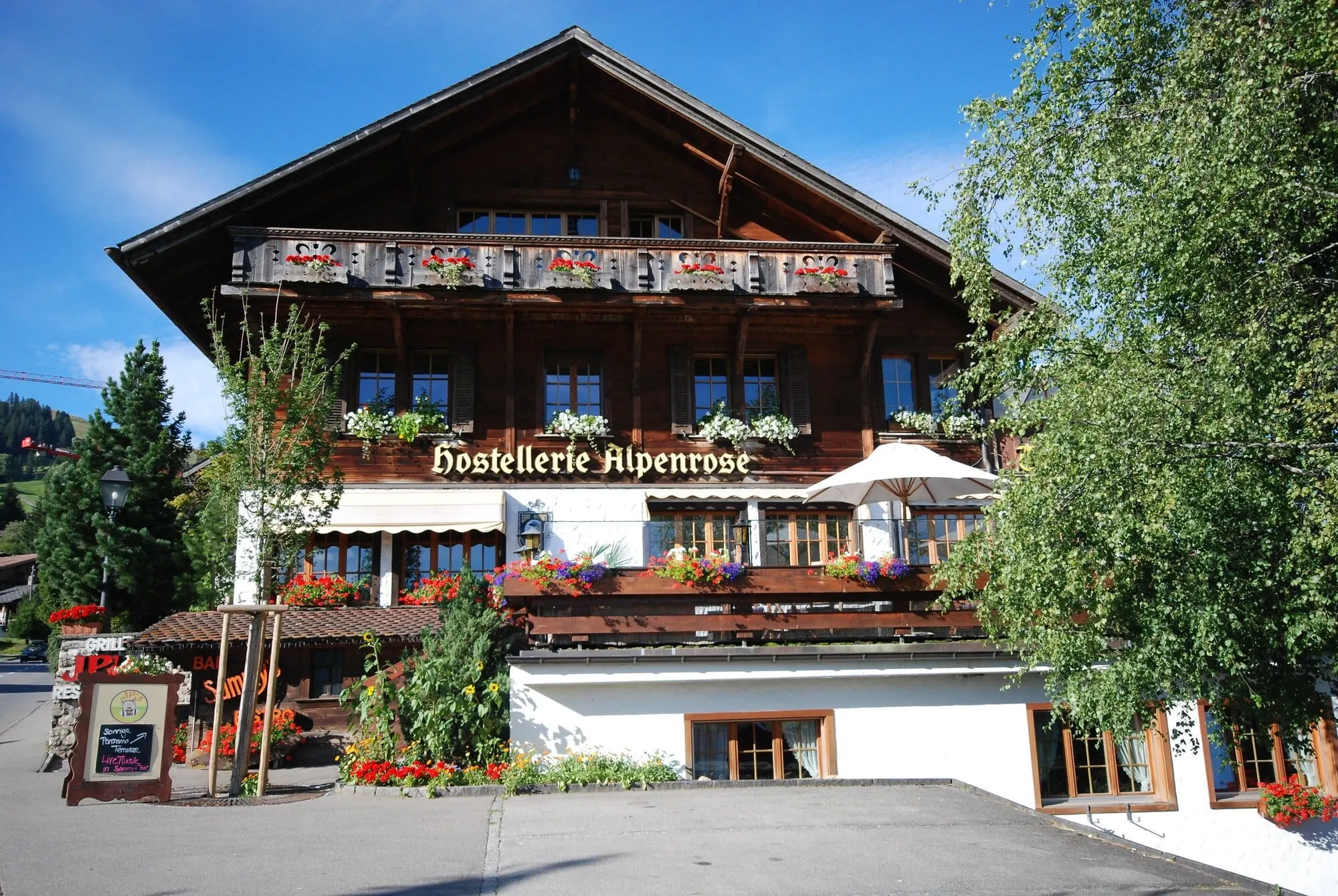 The hotel on Schönried's village street in summer
