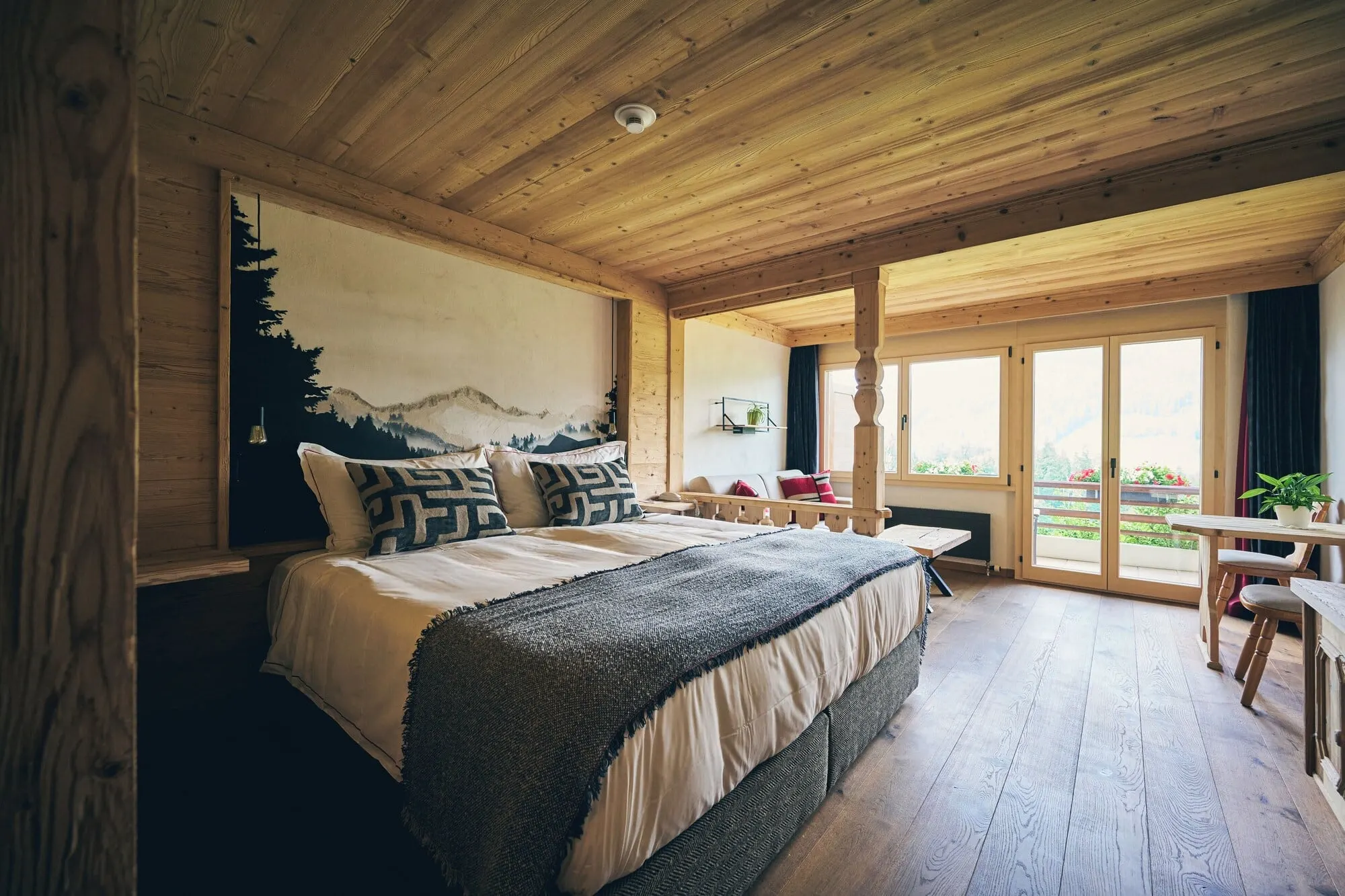 A bedroom opening onto a balcony