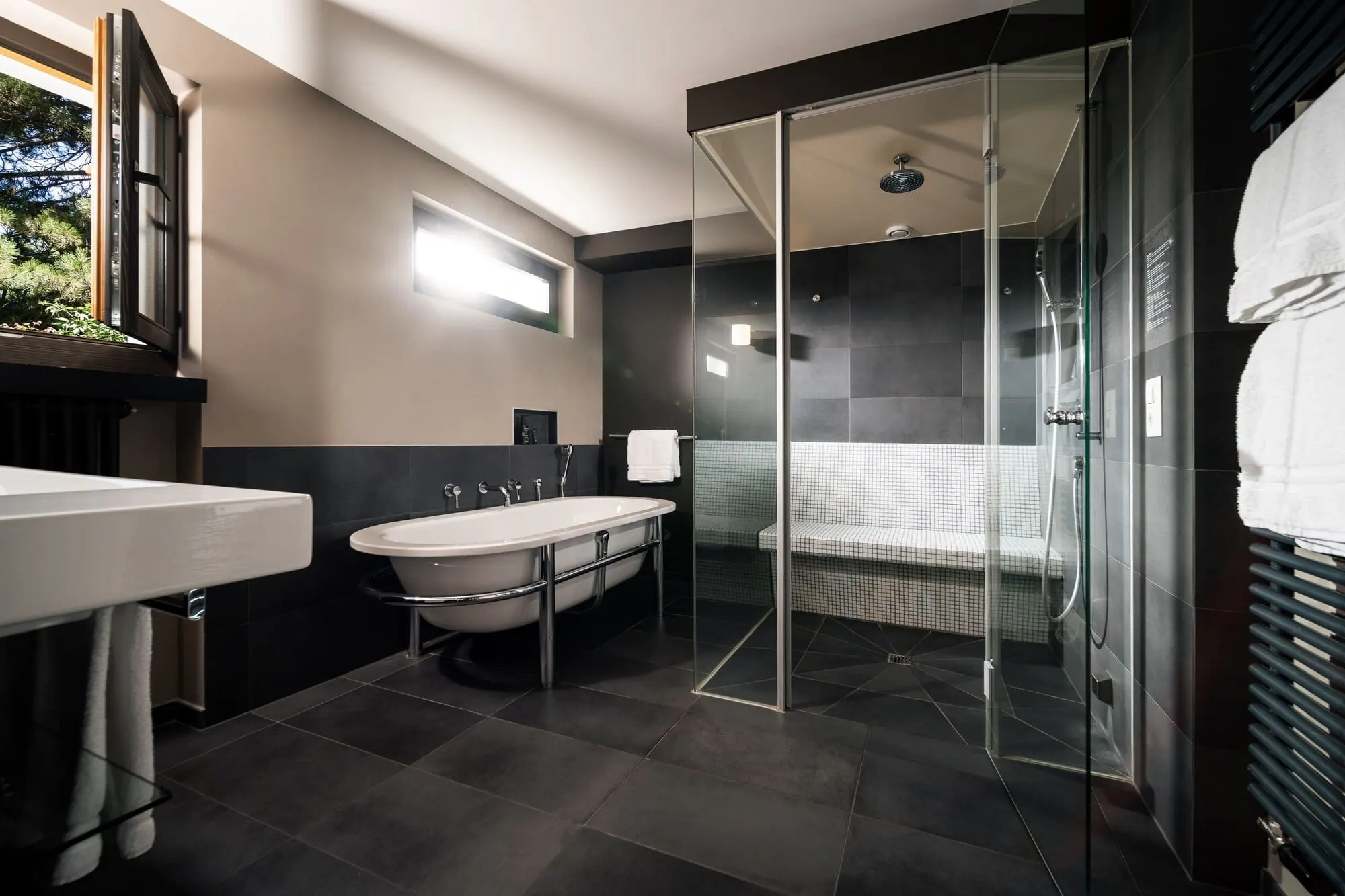 A bathroom with a freestanding bath