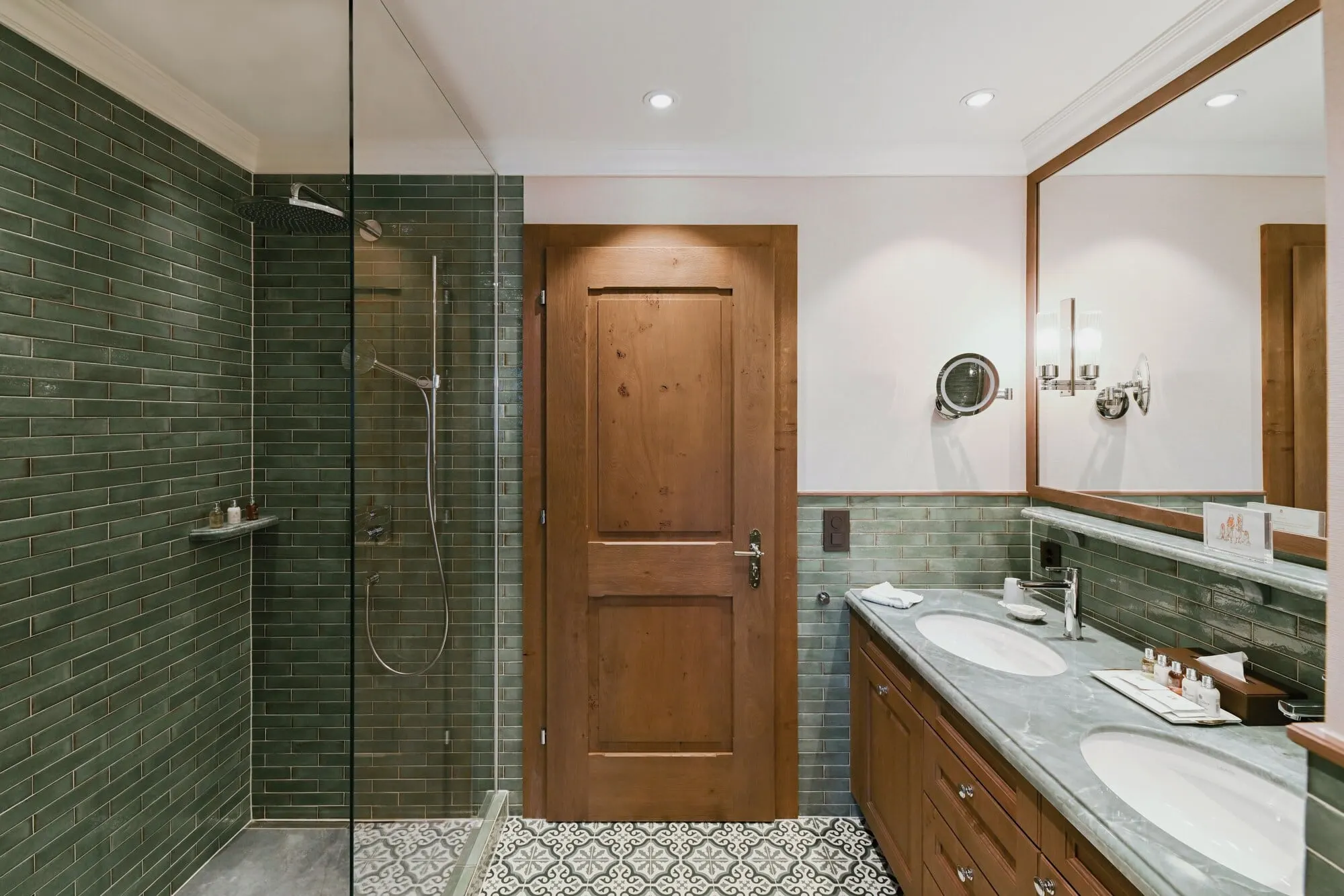 A bathroom with a glass shower