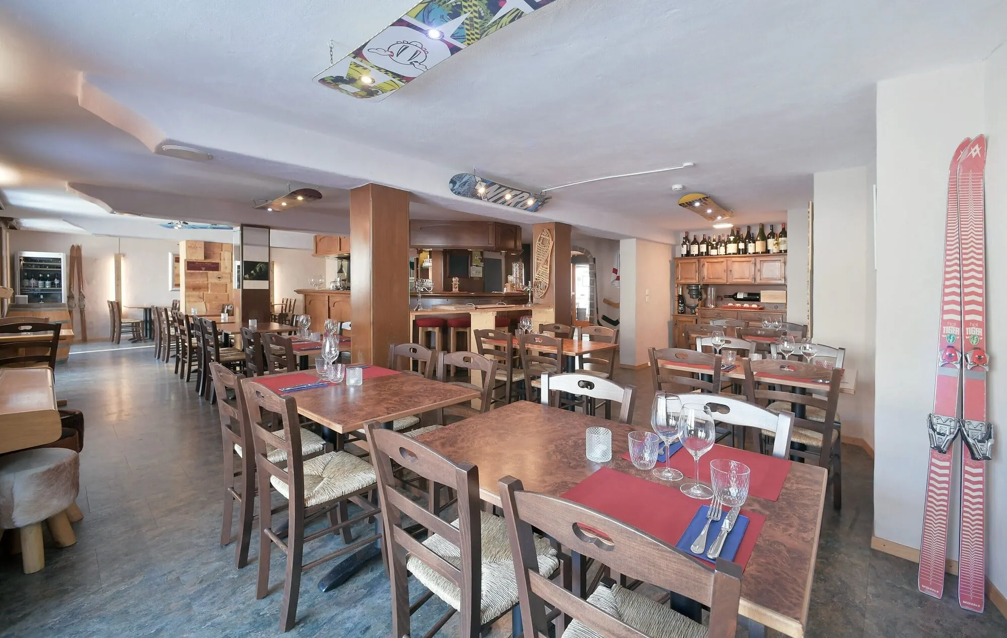 A dining room with wooden tables