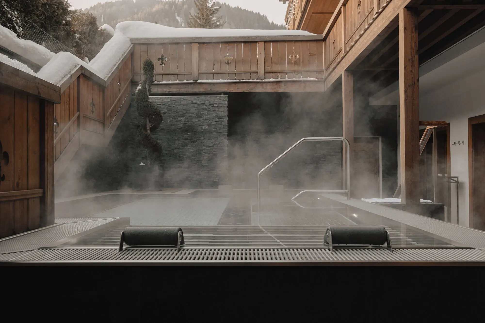 A steaming outdoor jacuzzi in winter