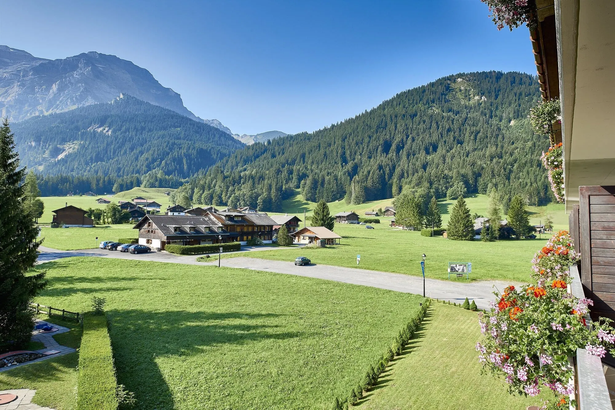 Mountain view over the garden in summer