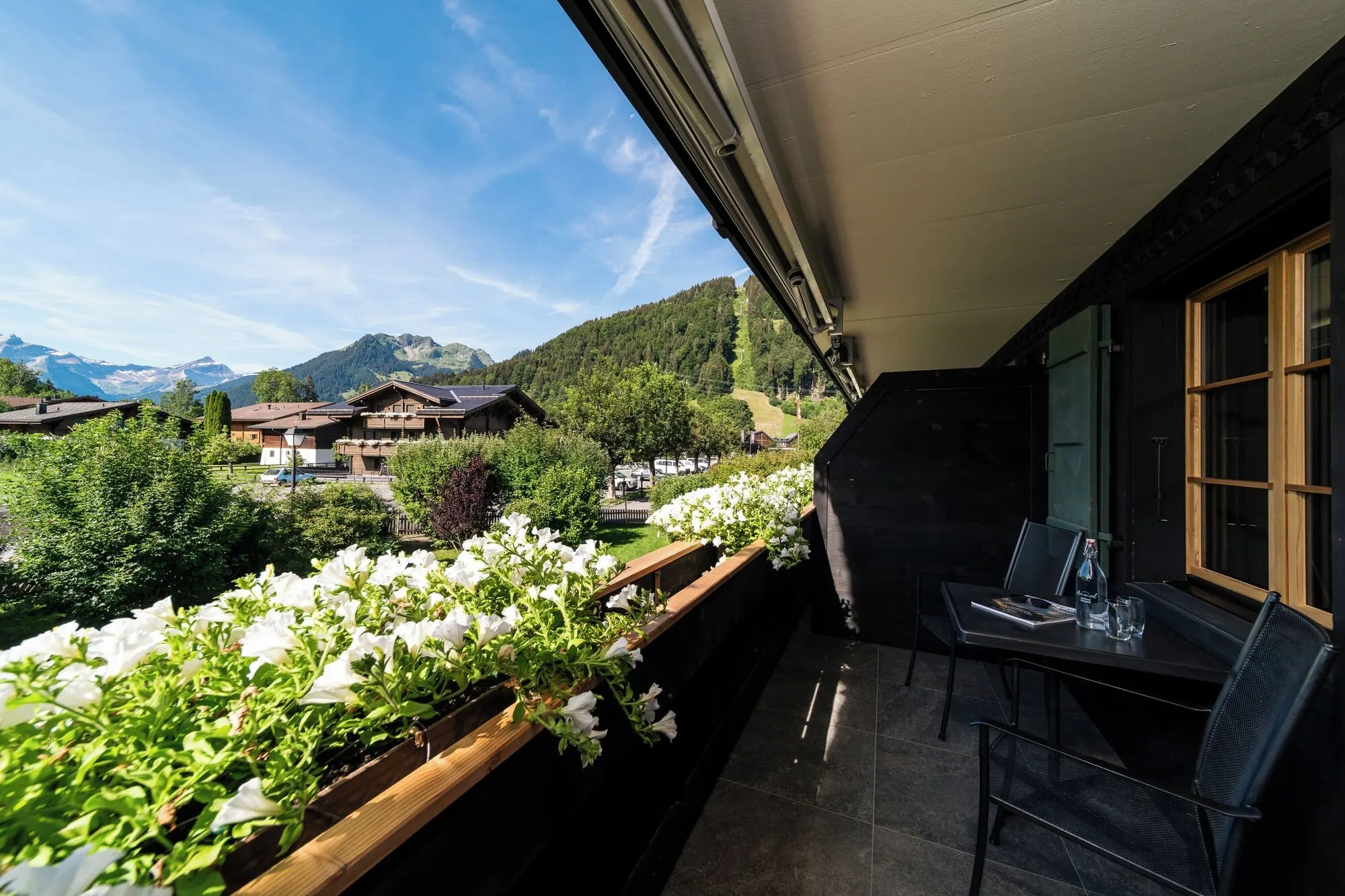 A balcony with a mountain view