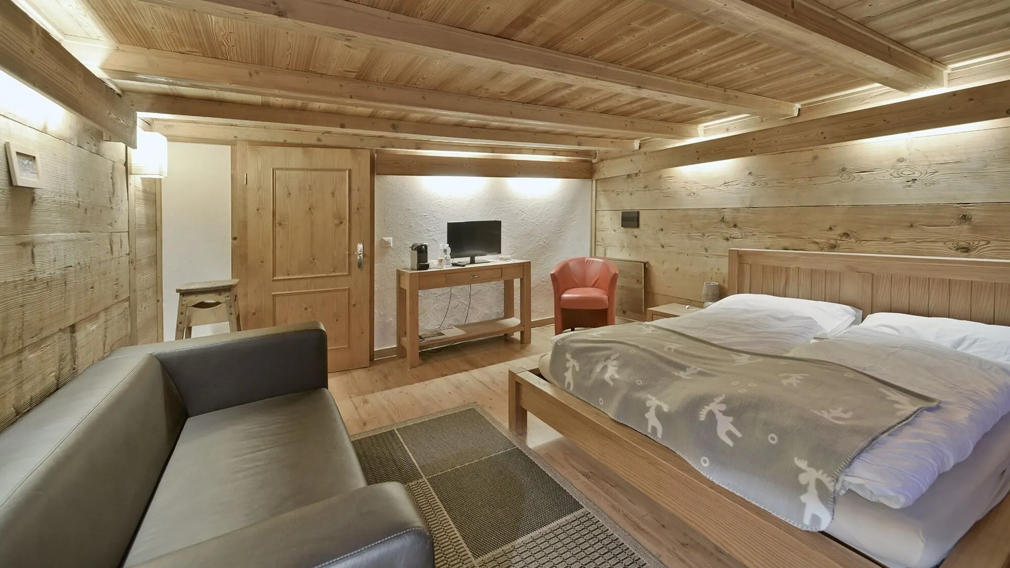A pine-panelled double room