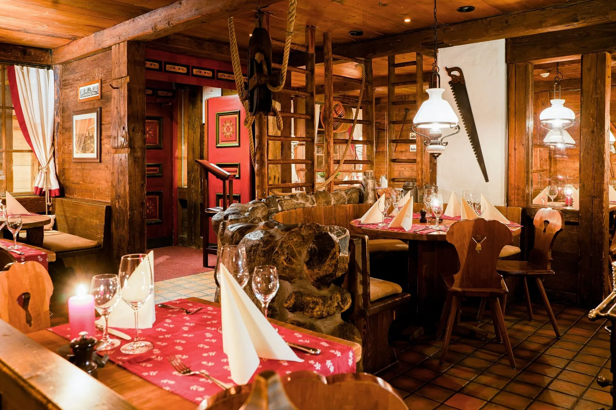 A rustic wood-panelled dining room