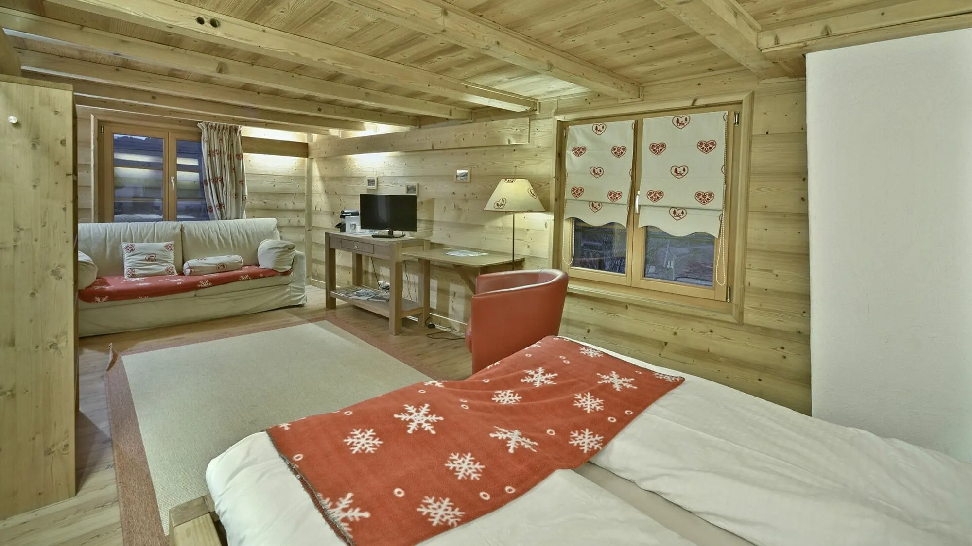 A junior suite with a sofa